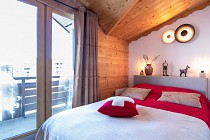 Chalet Diamant - slaapkamer met balkon en 2-persoonsbed